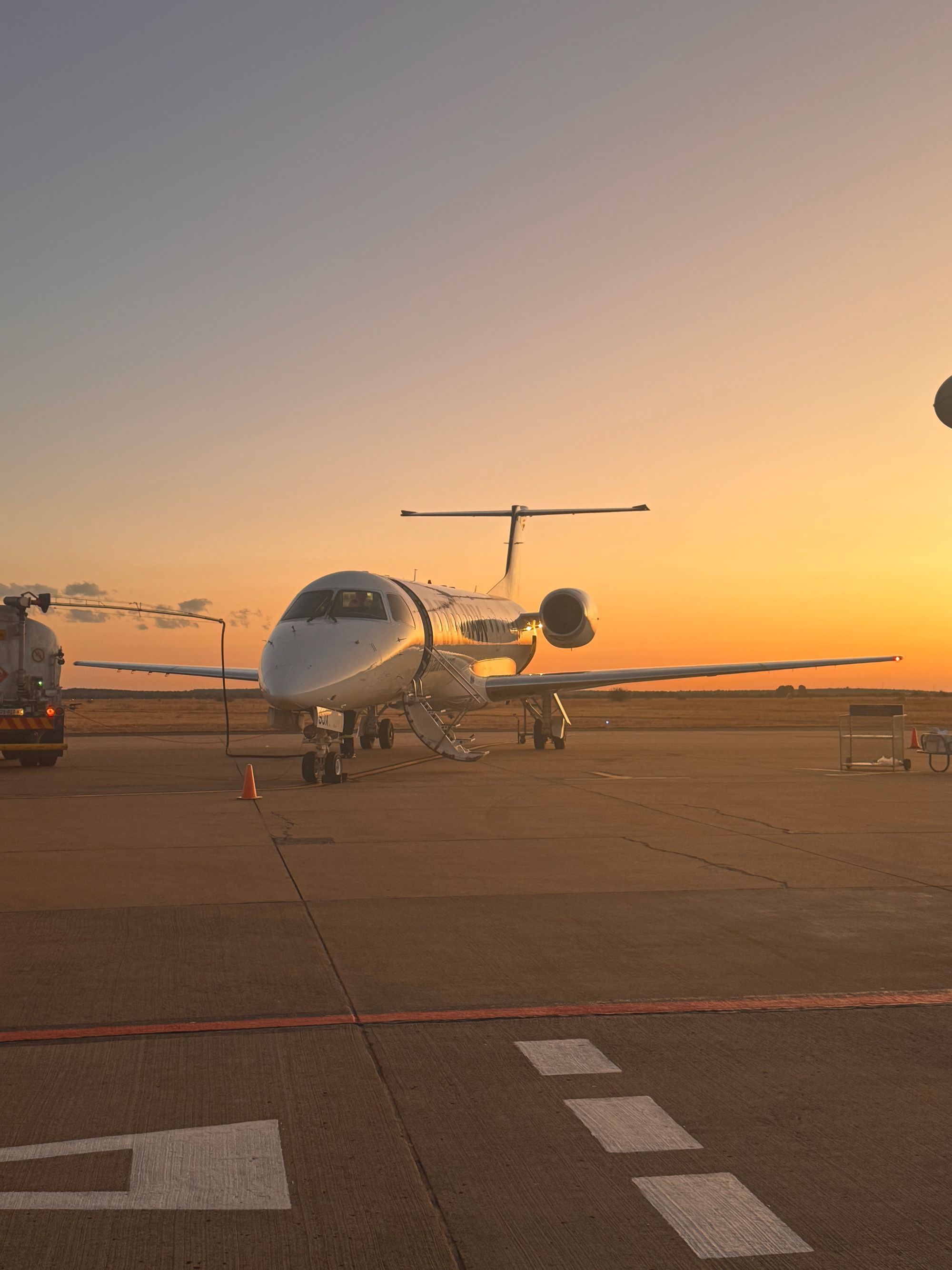 Jet on the apron at sunset